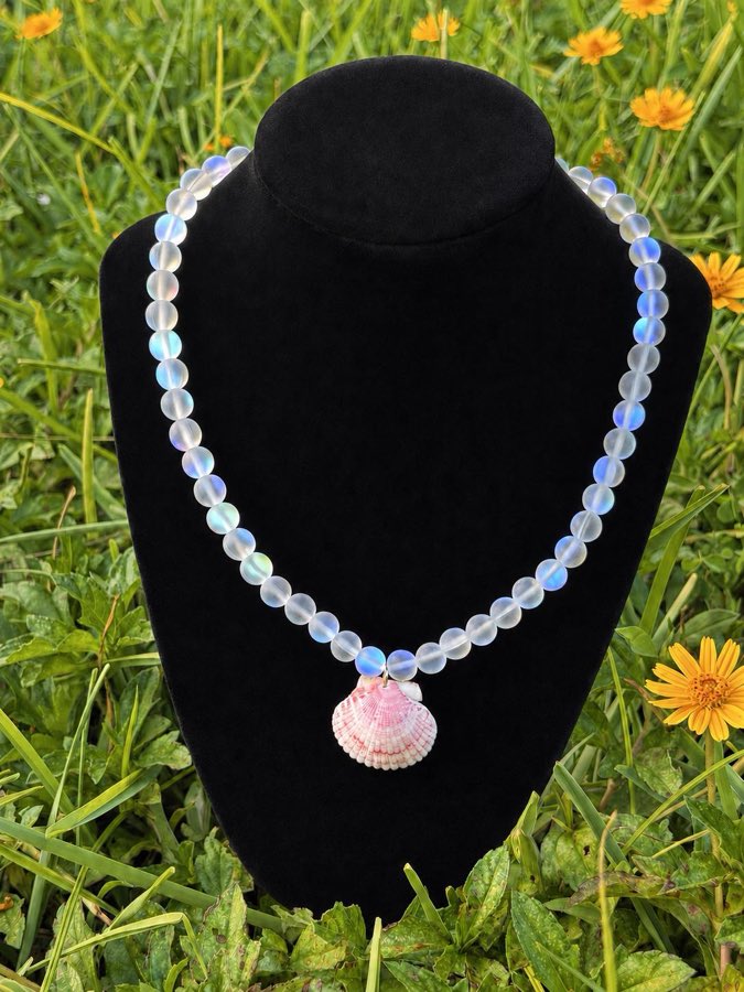 Seashell pendant necklace with iridescent aura beads and a pink scallop shell